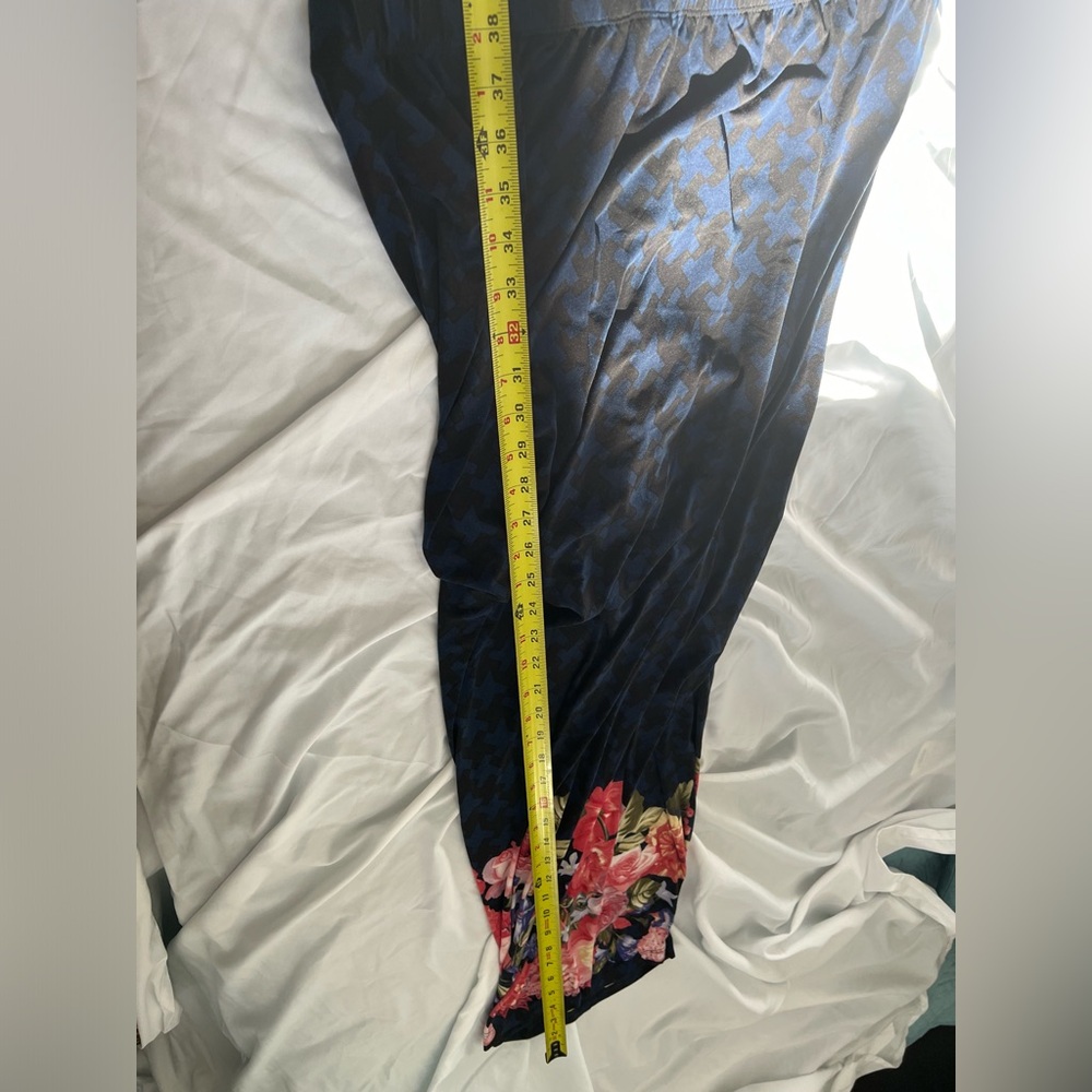 Travel pants blue, and black design with flowers on the bottom. See pics. K.